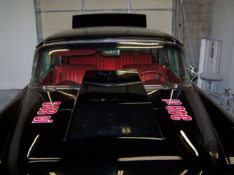 striping and lettering on a friends 55 Chevy gasserthe 348ci is hand 